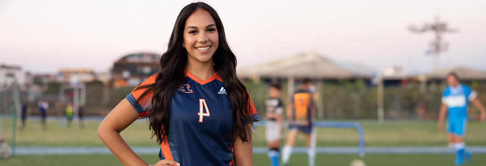 加比Amparano poses for the camera at Pima's soccer field.